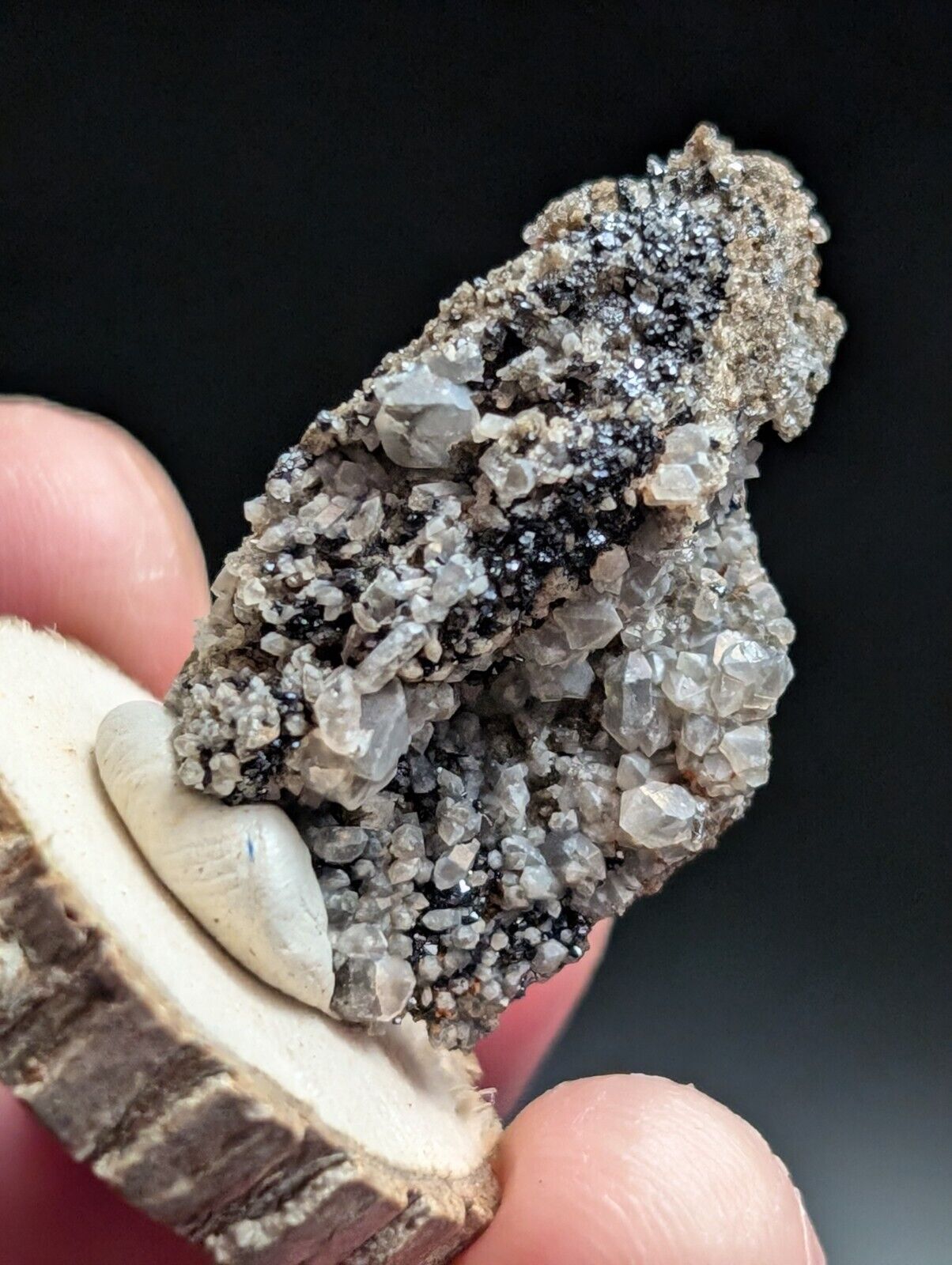 Cluster of gray and black crystals.