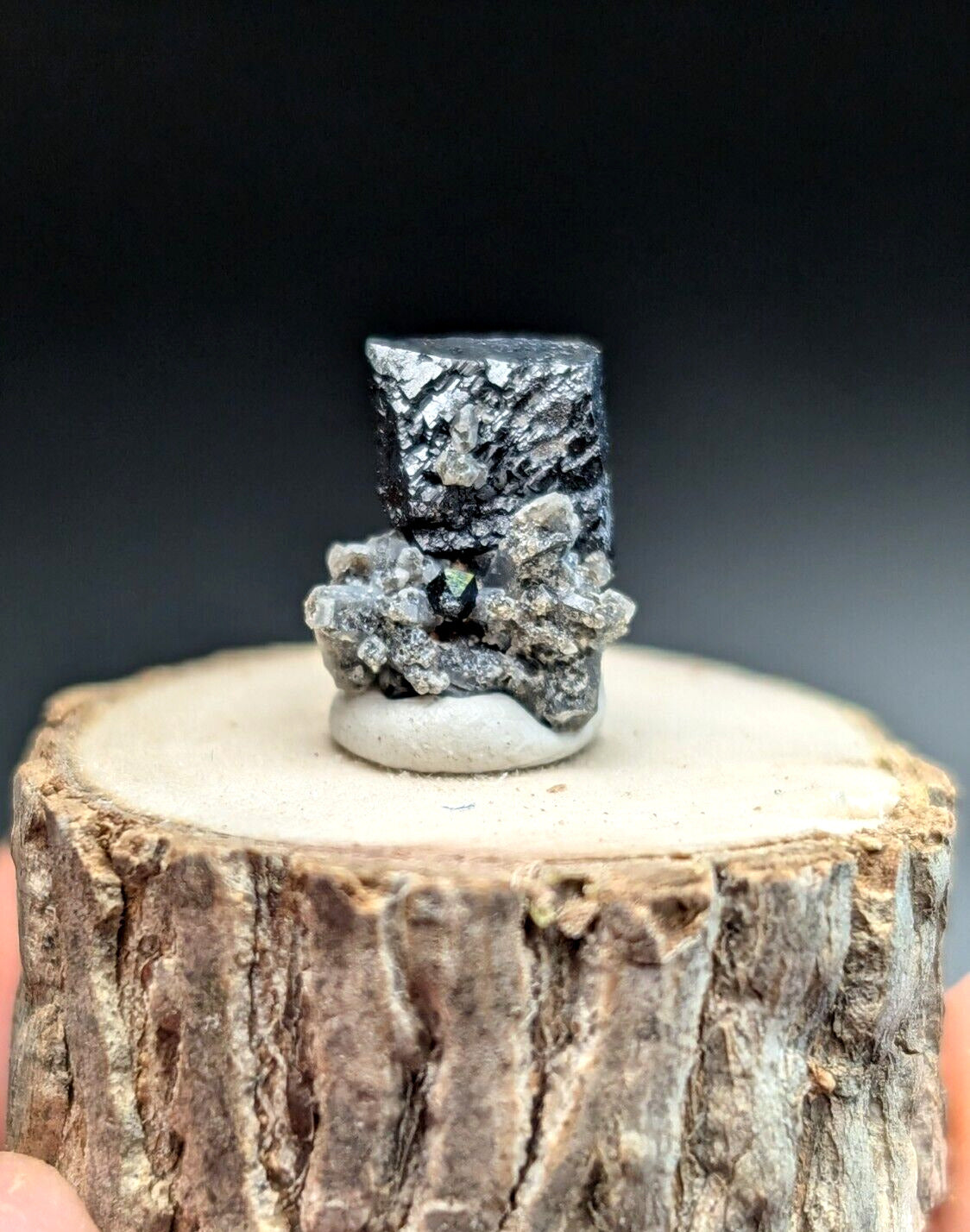Black and silver mineral specimen.