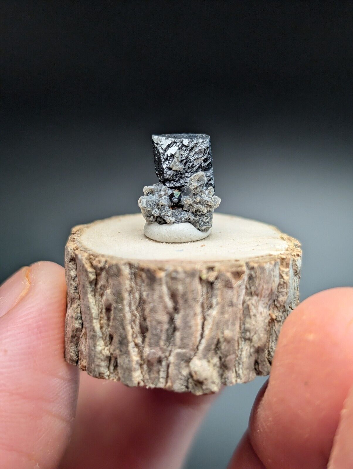 Metallic gray mineral specimen.