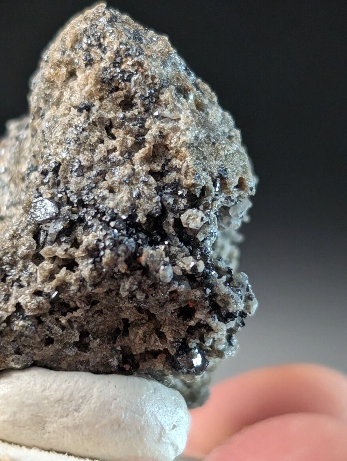 Rough, gray mineral specimen.