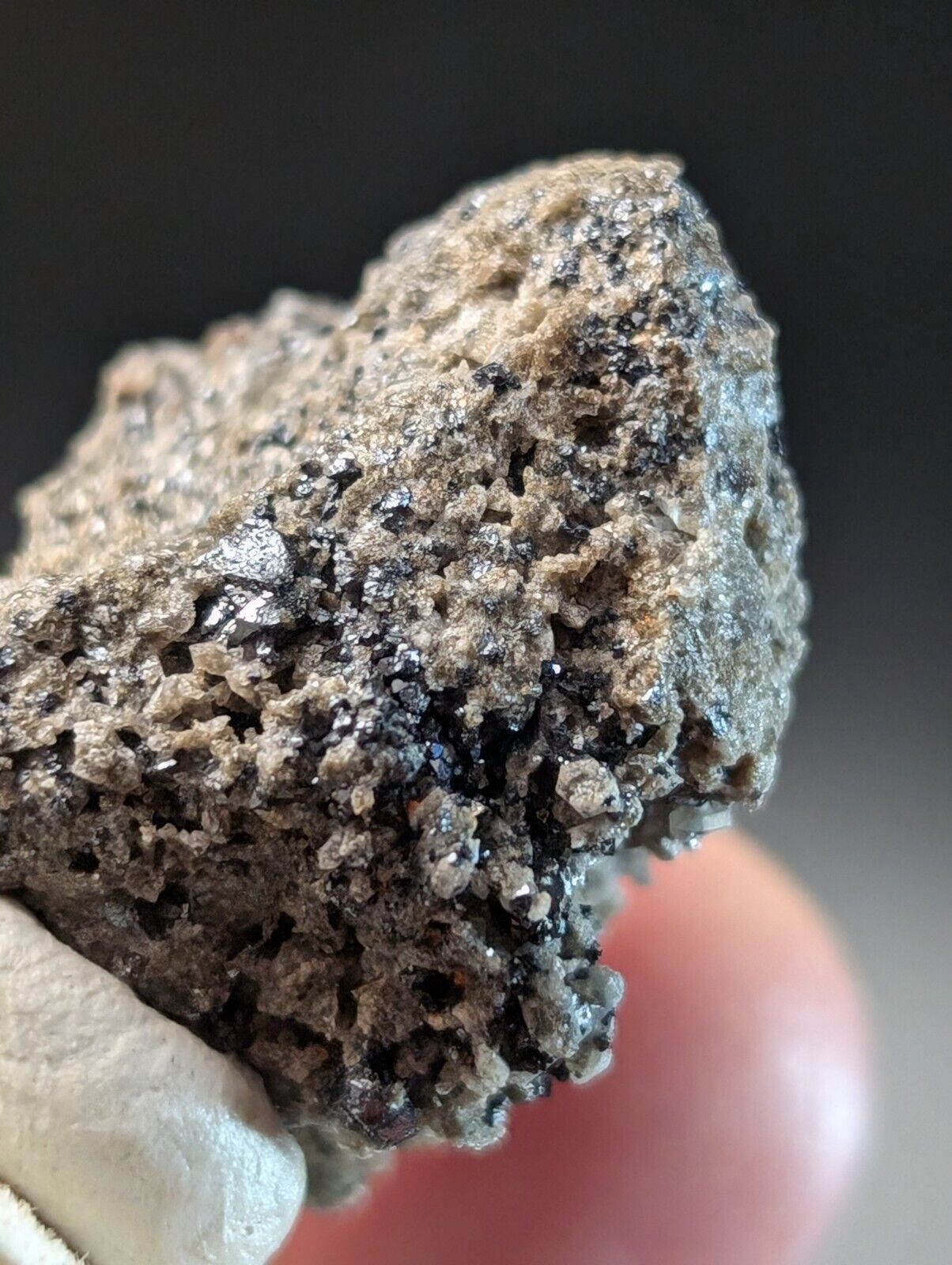 Rough, textured mineral specimen.