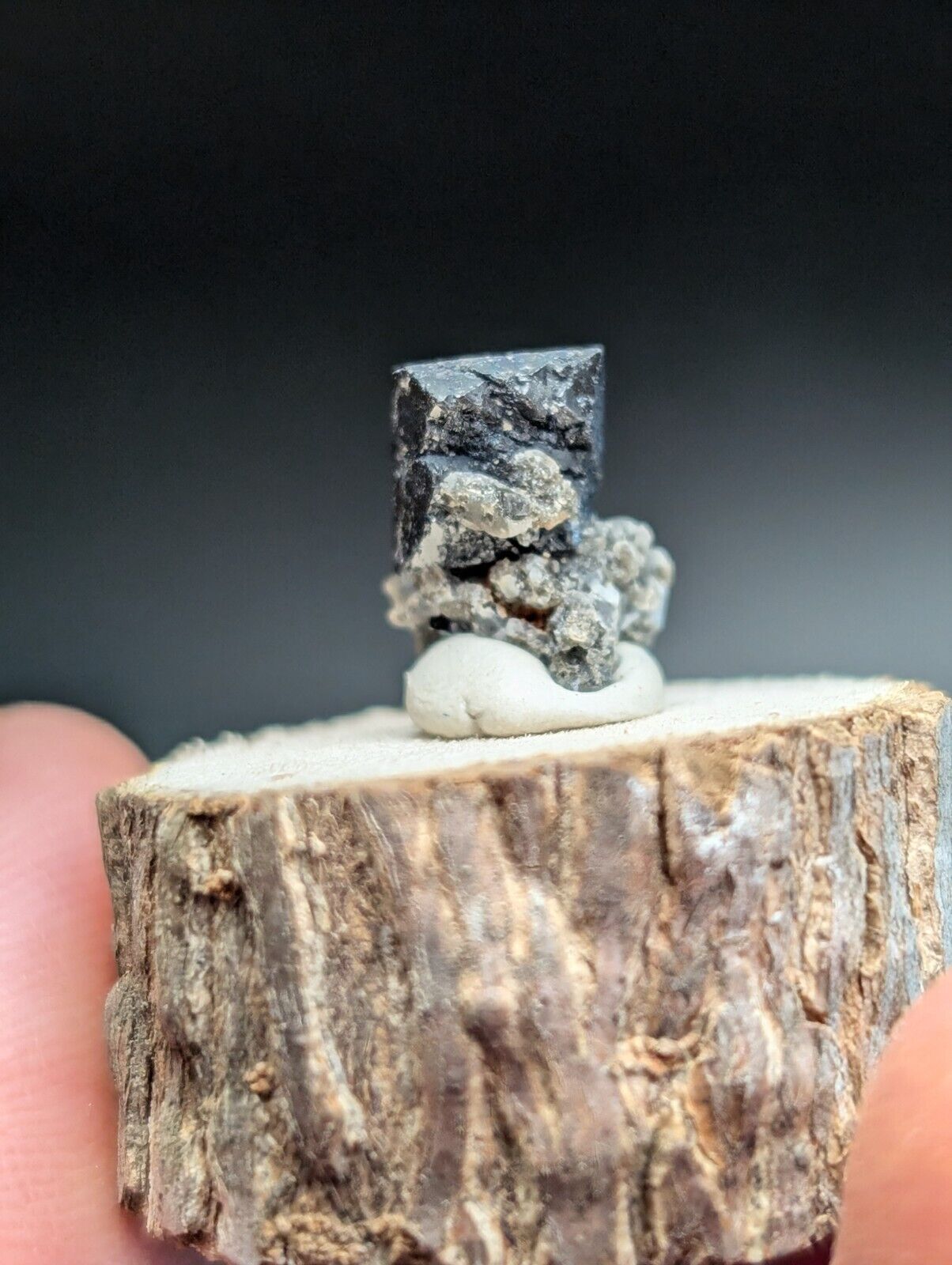 Black crystal mineral specimen.