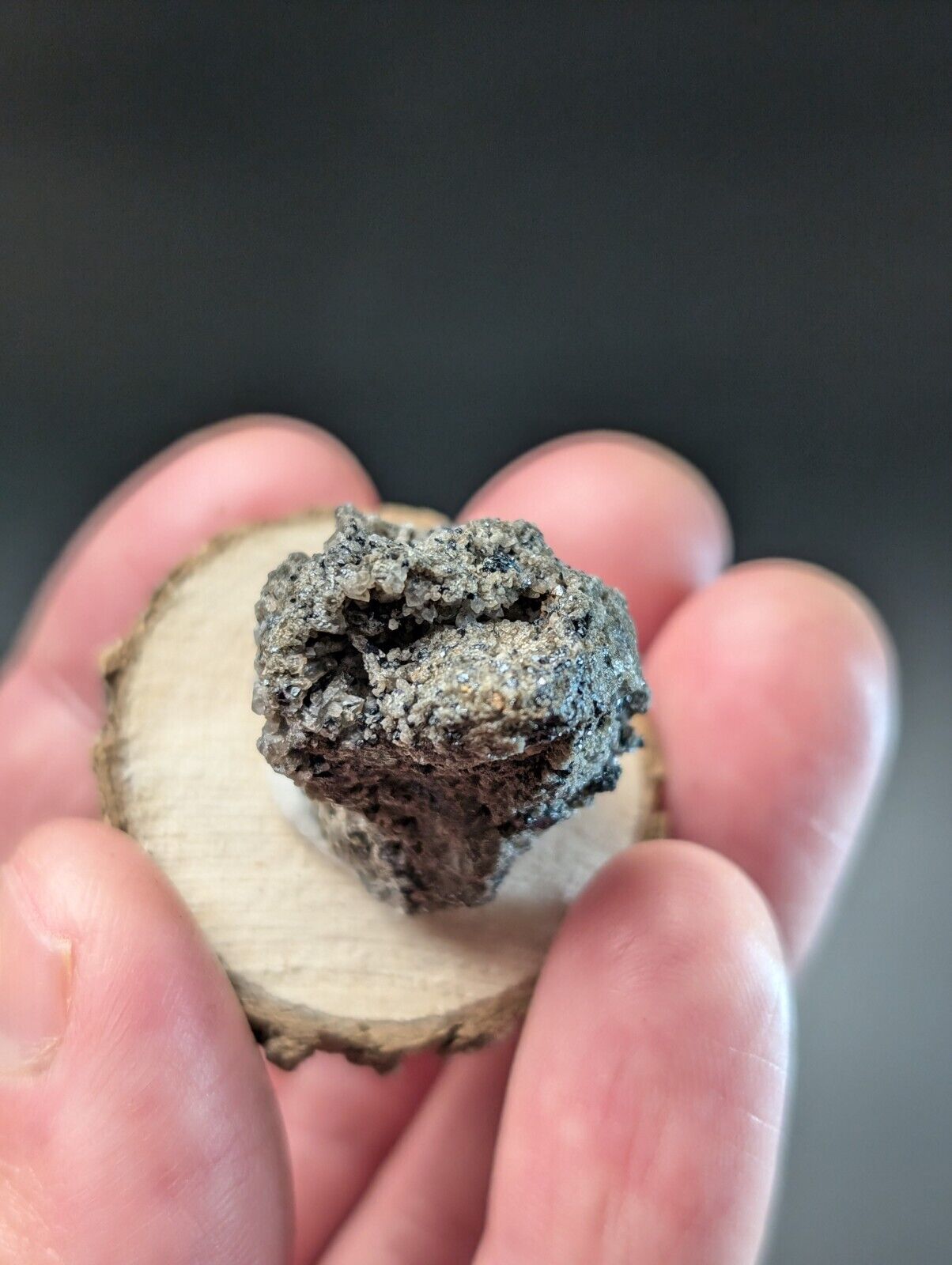 Rough, gray mineral specimen.