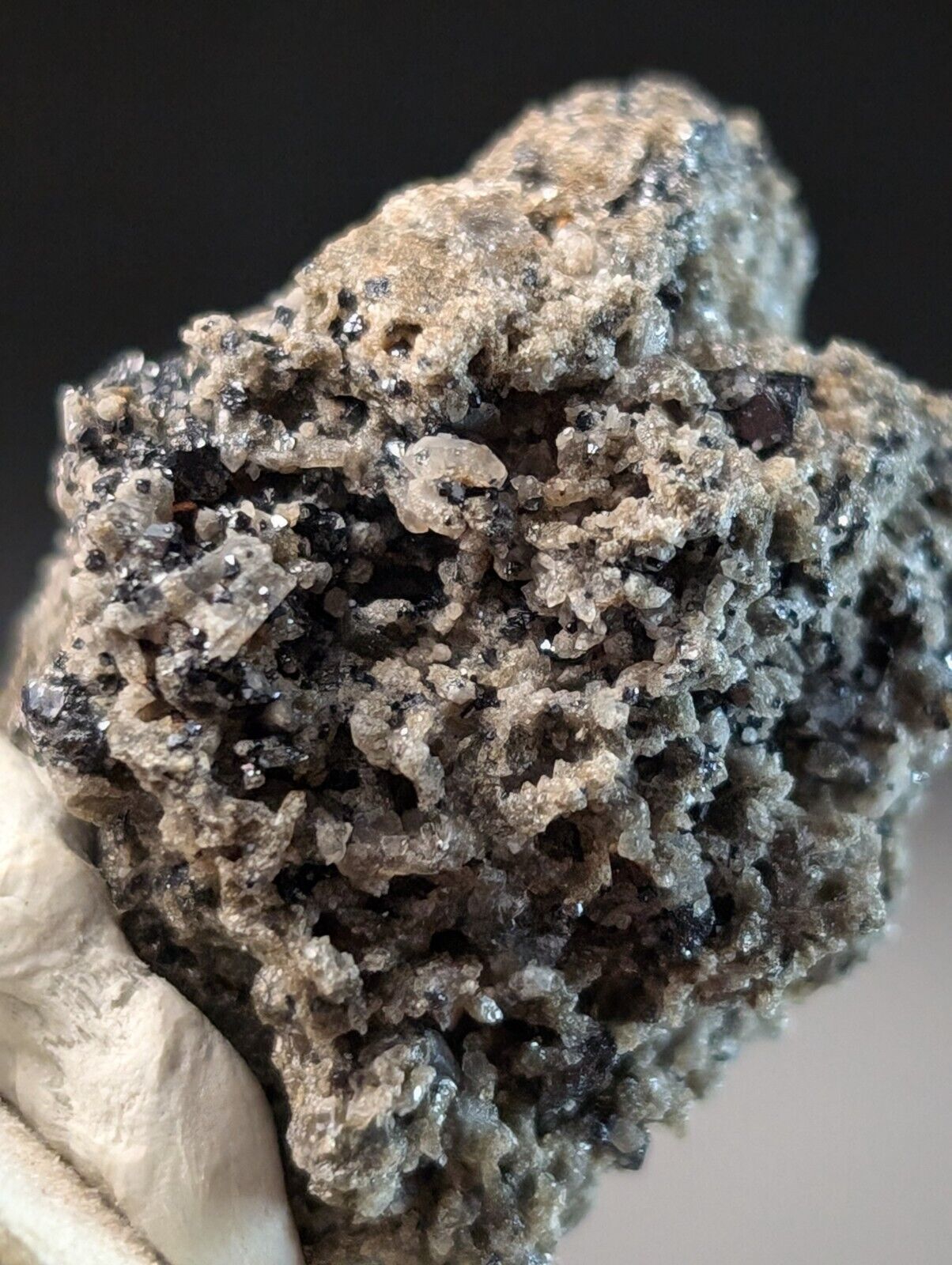 Rough, crystalline mineral specimen.