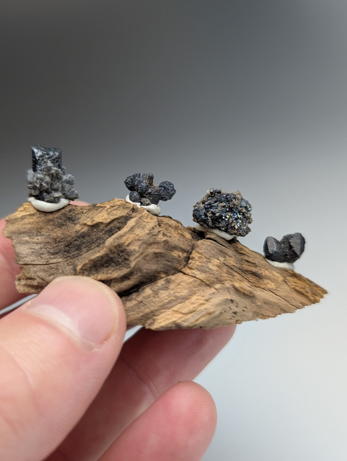 Set of 4 Brookite + Smoky Quartz, Magnet Cove, Arkansas, Old Stock, + wood stand