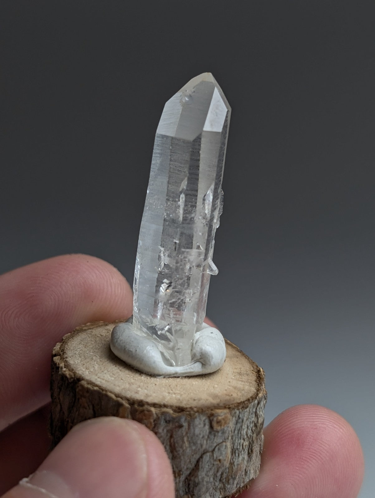Manifestation Quartz, Old Stock, Montgomery County, Arkansas, w/ wood base