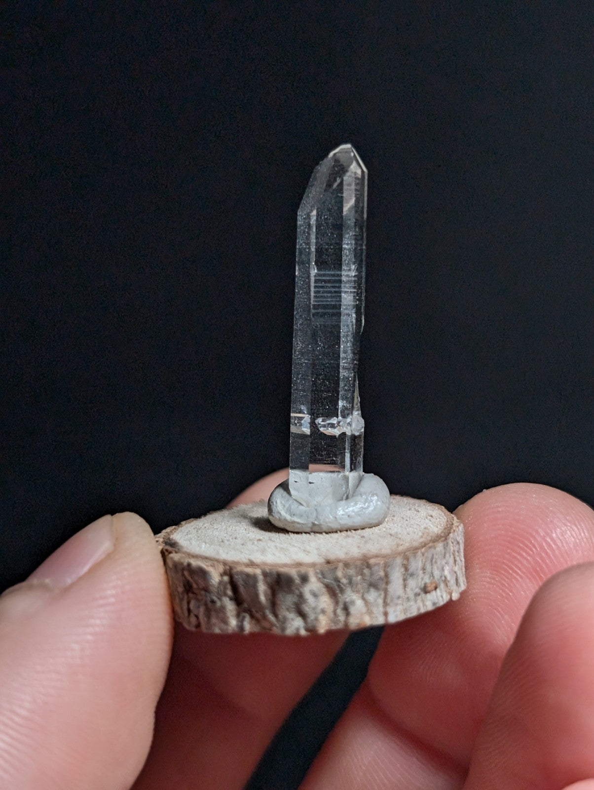 A+ Penetrator Quartz, Old Stock, Montgomery County, Arkansas, w/ wood base