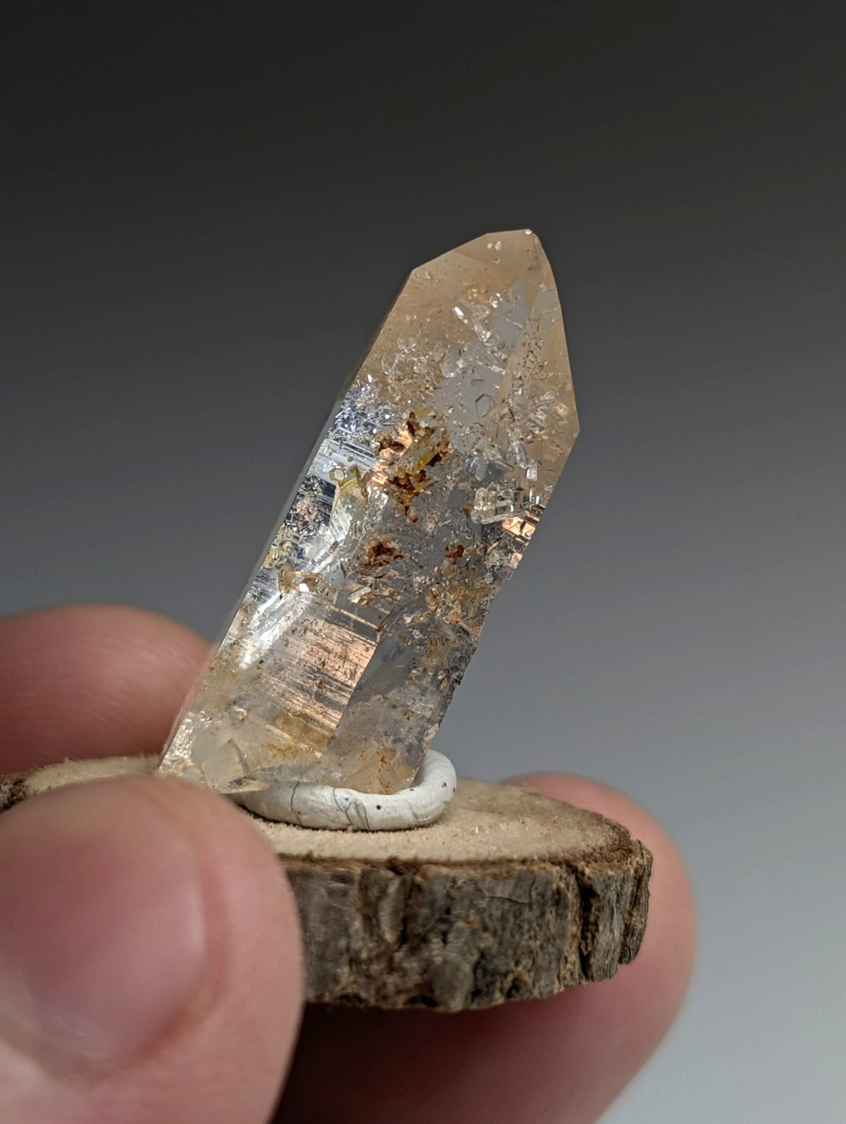 Optical Quartz Crystal Point, Montgomery County, Arkansas, USA, w/ wood mount
