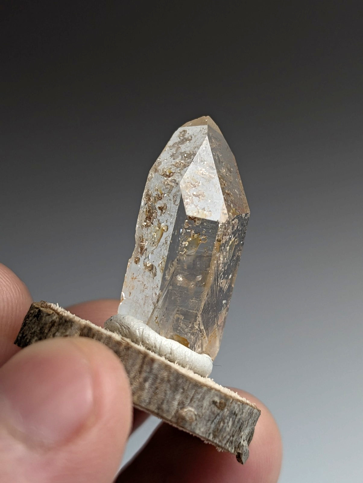 Optical Quartz Crystal Point, Montgomery County, Arkansas, USA, w/ wood mount