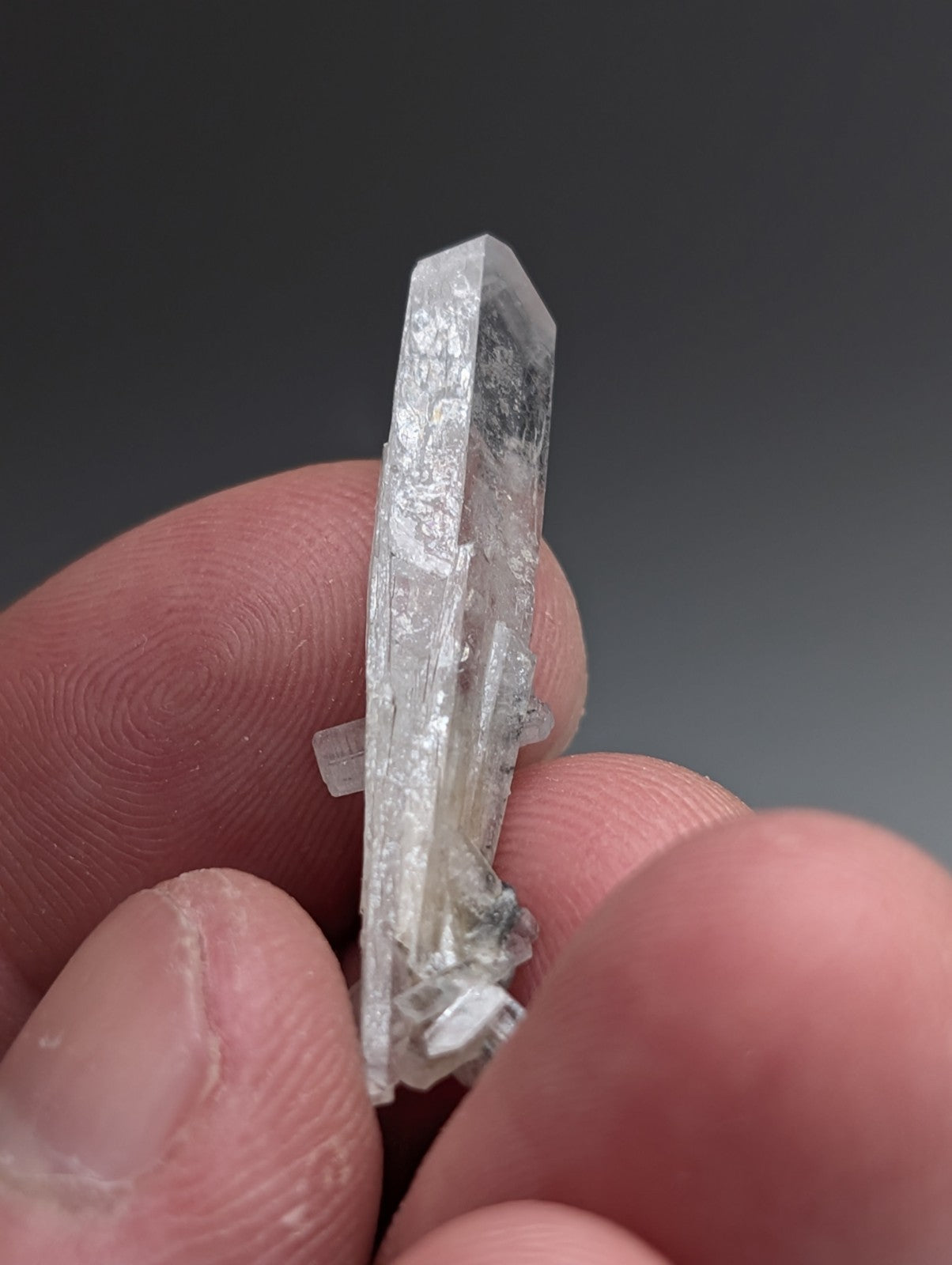 A translucent clear quartz a barite crystal with faceted top and natural inclusions from magnet cove arkansas