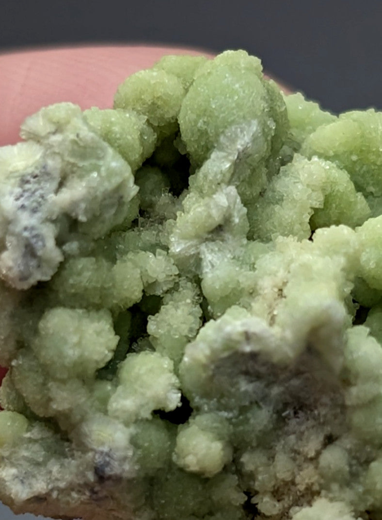 A cluster of pale green translucent fluorwavellite intermixed with sio2 crystalline minerals from Mauldin Mountain Arkansas