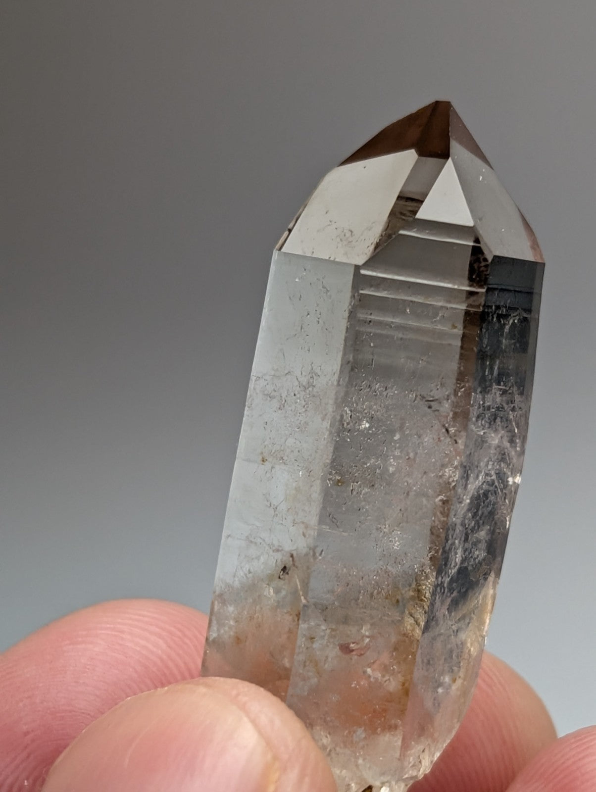 A+++ natural smoky quartz crystal point with translucent color and internal inclusions from Garland County Arkansas USA