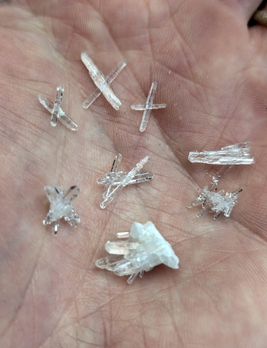 Clear quartz crystals with intricate cross-shaped clustered formations from jeffrey quarry arkansas old stock set of 8