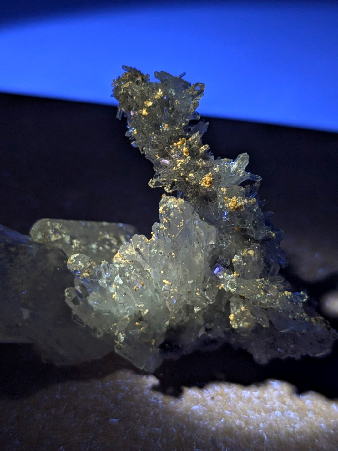A translucent a++++ solution quartz with uv reactive cookeite and golden inclusions from jeffrey quarry arkansas rare specimen