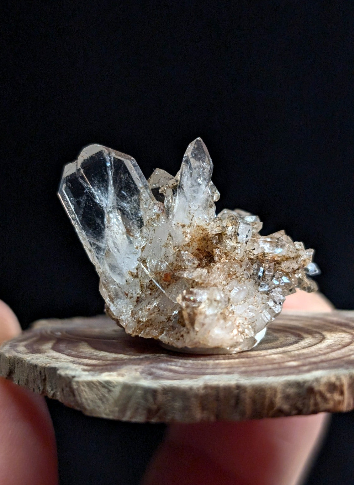 A+ tabby quartz crystal cluster with sharp clear quartz points and an earthy brownish rough base from arkansas