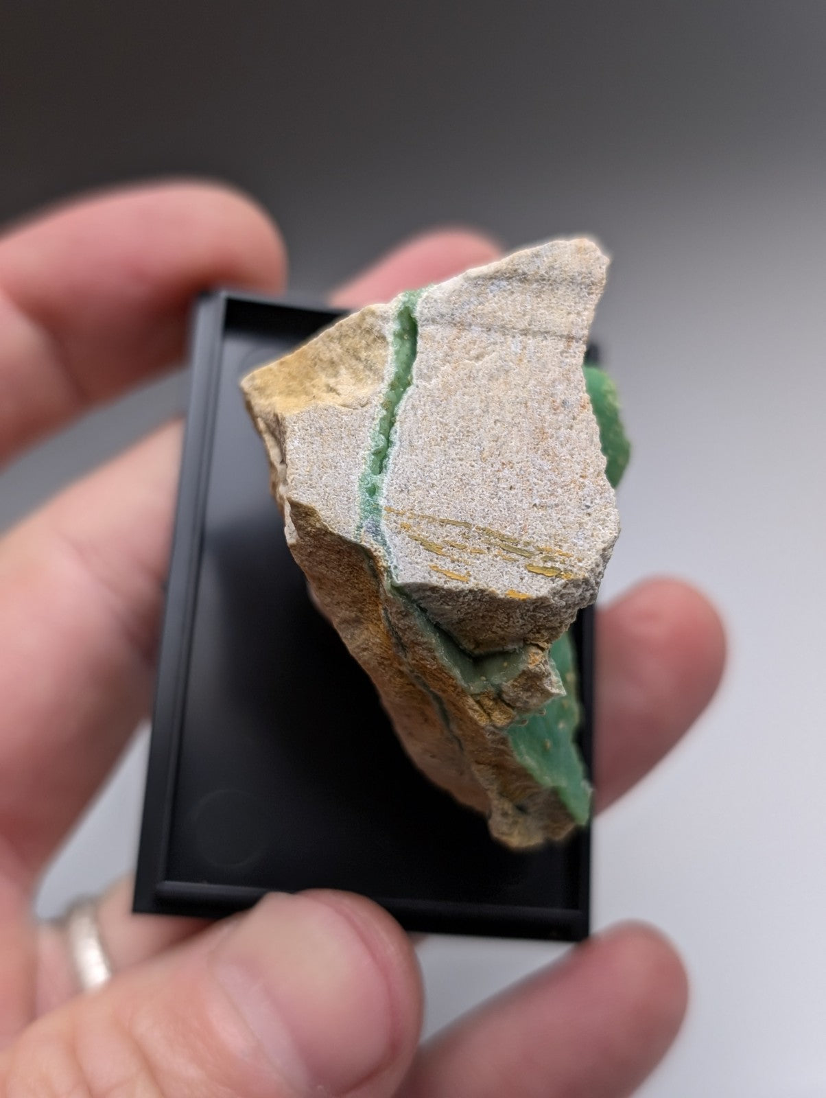 A+ wavellite on variscite mineral specimen with textured grayish brown exterior and green veins from Garland County Arkansas