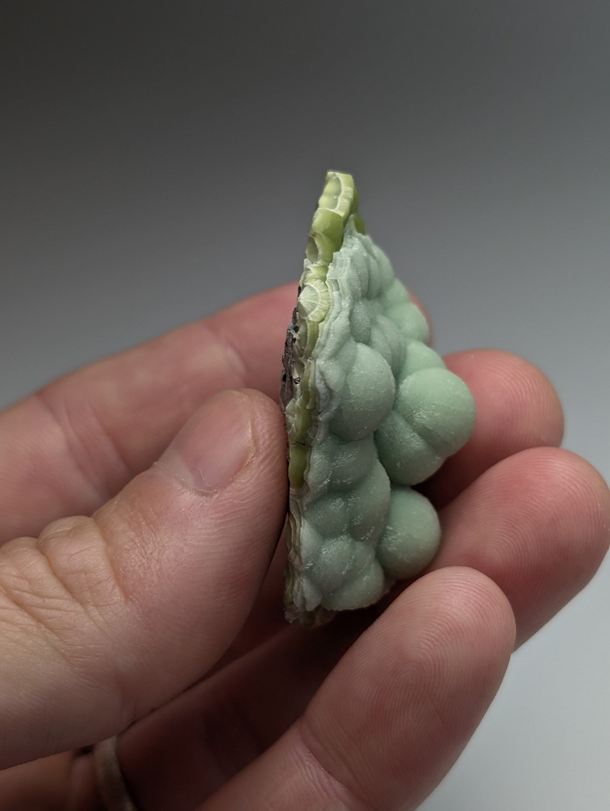 Amazing A+++ wavellite mineral specimen with pale green bubble-like formations and rough layered edge from Arkansas