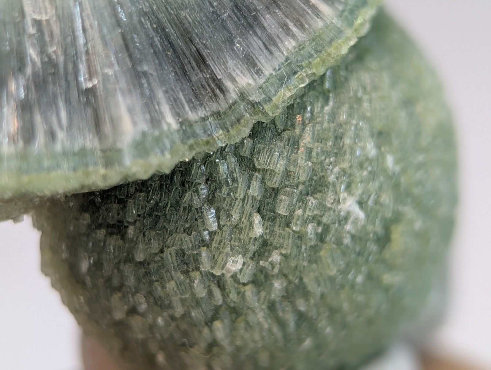 Amazing wavellite green mineral specimen with translucent fan-like crystals on handmade wood mount from Arkansas