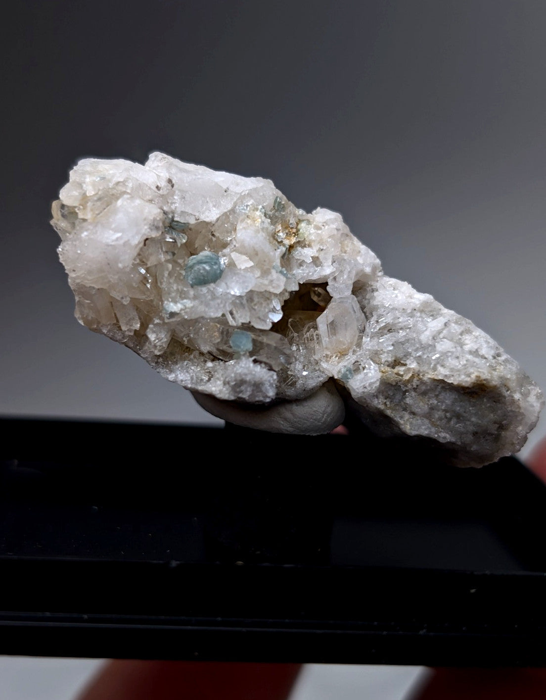 Blue-green cookeite on quartz cluster with translucent white crystal and blue golden mineral inclusions from arkansas