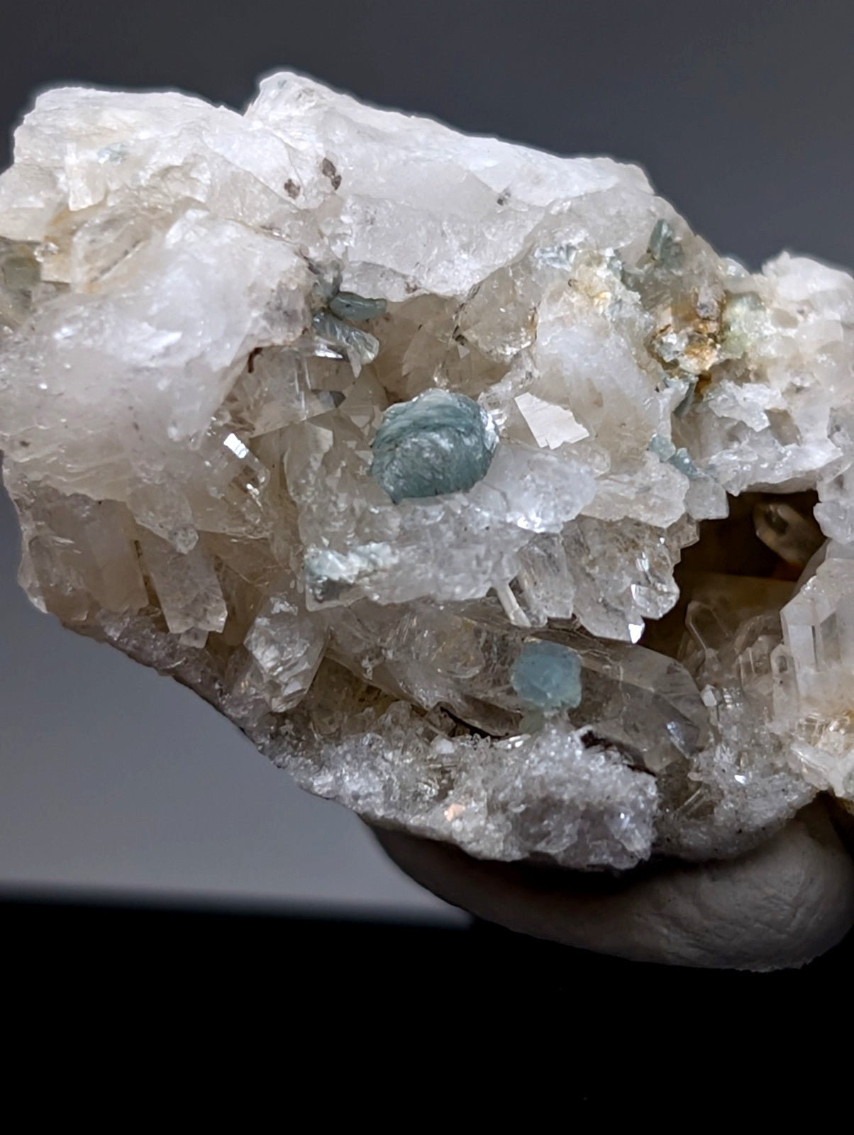 Blue-green cookeite on clear quartz cluster with light blue-green gemstones from saline county Arkansas old stock UV reactive