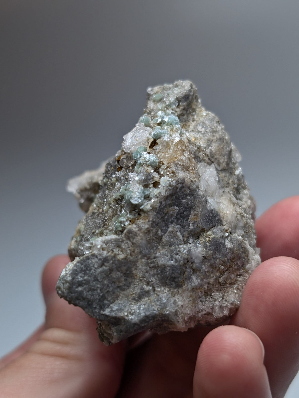 Blue green cookeite on quartz mineral with gray base and light blue crystals from saline county arkansas rare uv reactive