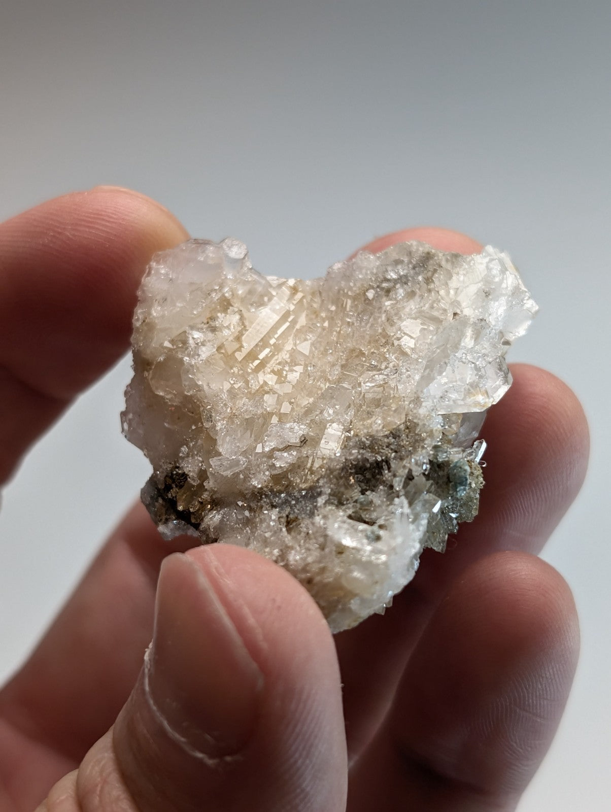 Blue green cookeite on quartz translucent crystalline mineral with clear and pale gray facets from saline county Arkansas