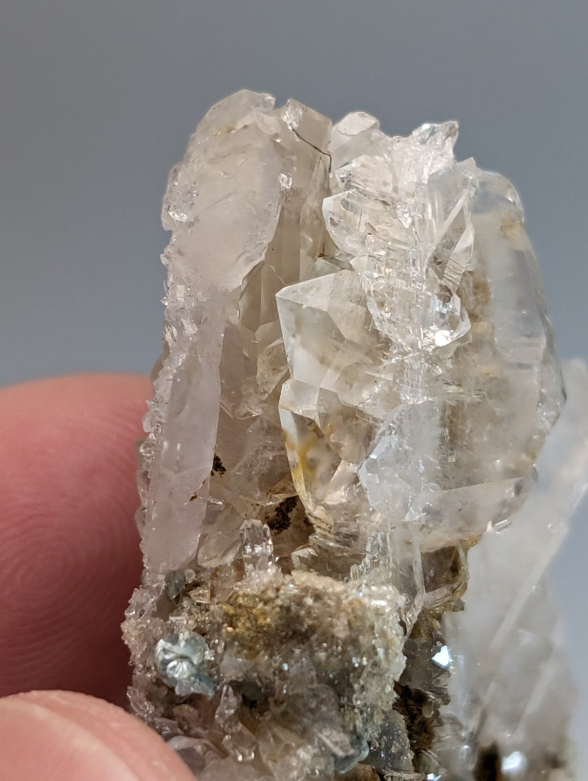 Blue green cookeite on quartz with translucent clear quartz cluster and rough earthy base from saline county arkansas