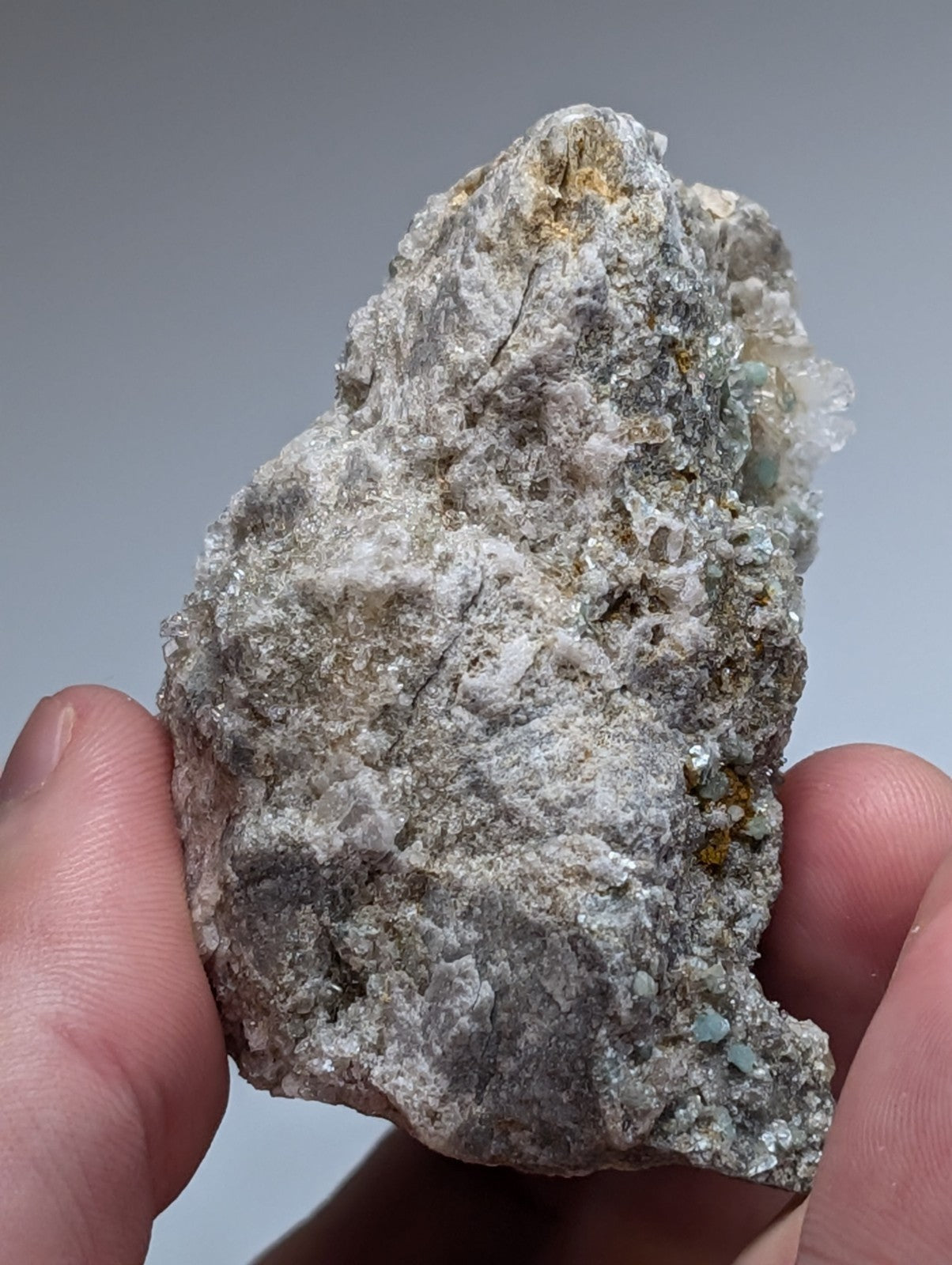 Blue green cookeite on quartz from saline county arkansas with gray white crystals and translucent blue green formations