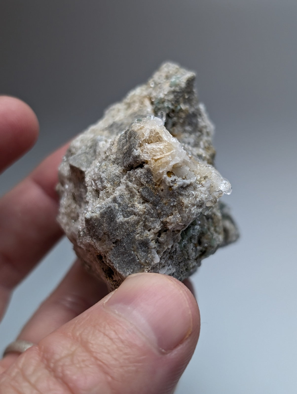Blue green cookeite on quartz mineral specimen with translucent crystalline formations from saline county arkansas rare uv reactive