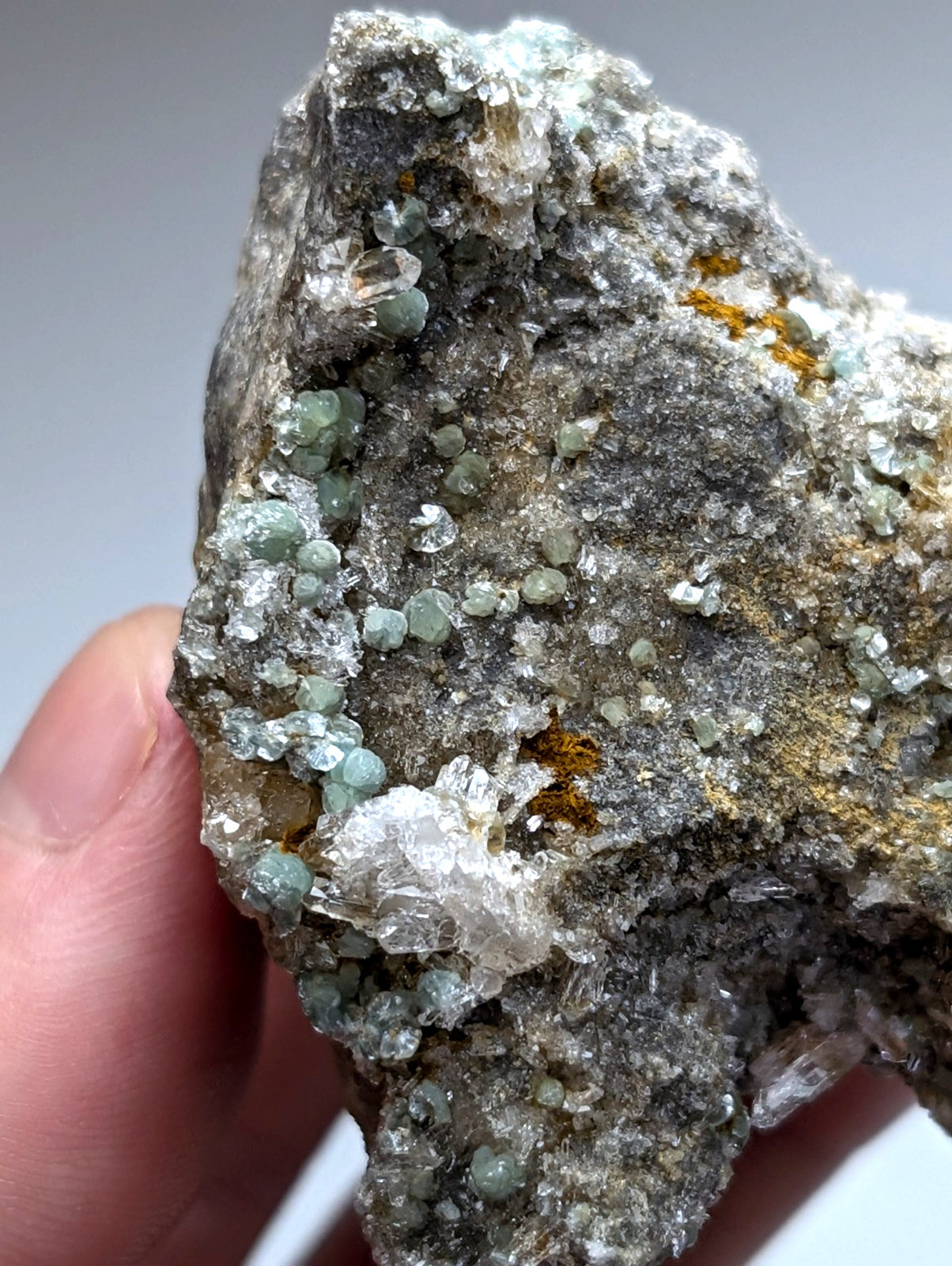 Blue green cookeite clusters with clear quartz on a rough gray rock from saline county arkansas rare uv reactive specimen