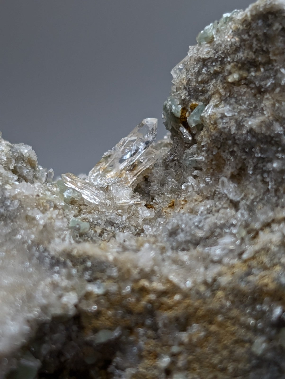 Clear translucent quartz crystals on blue green cookeite matrix mineral rock rare uv reactive from saline county arkansas