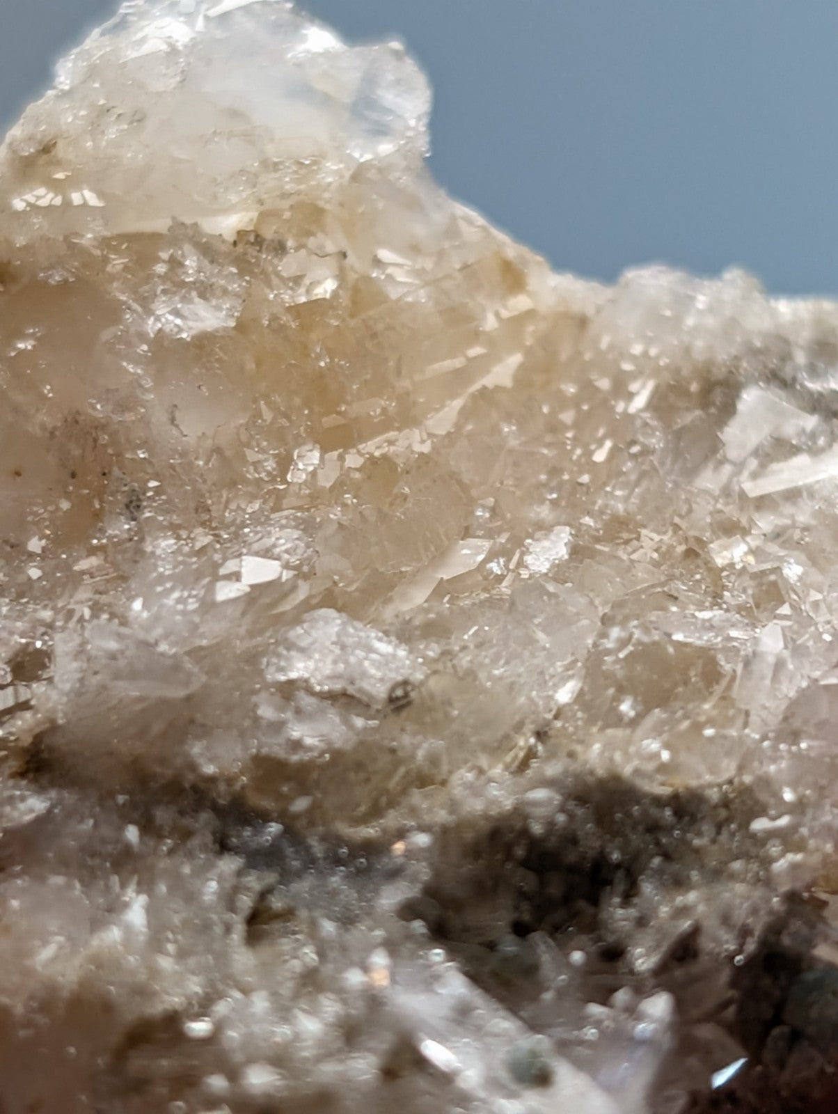 A translucent blue green cookeite on quartz with clear and pale amber hues from saline county arkansas rare uv reactive mineral