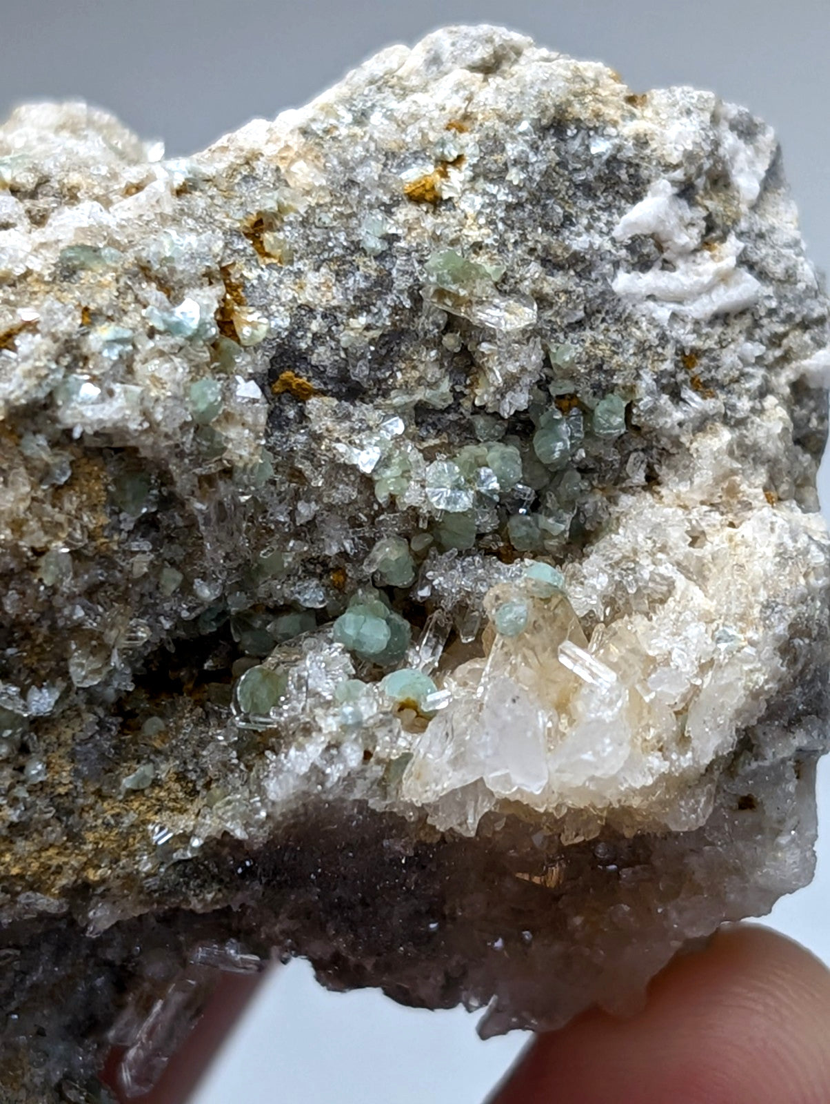 Blue green cookeite on quartz rough gray rock with translucent green and clear crystals from saline county arkansas rare uv reactive