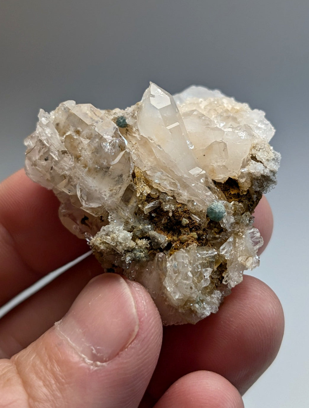 Translucent quartz crystal cluster with blue green cookeite on quartz from saline county arkansas rare uv reactive mineral
