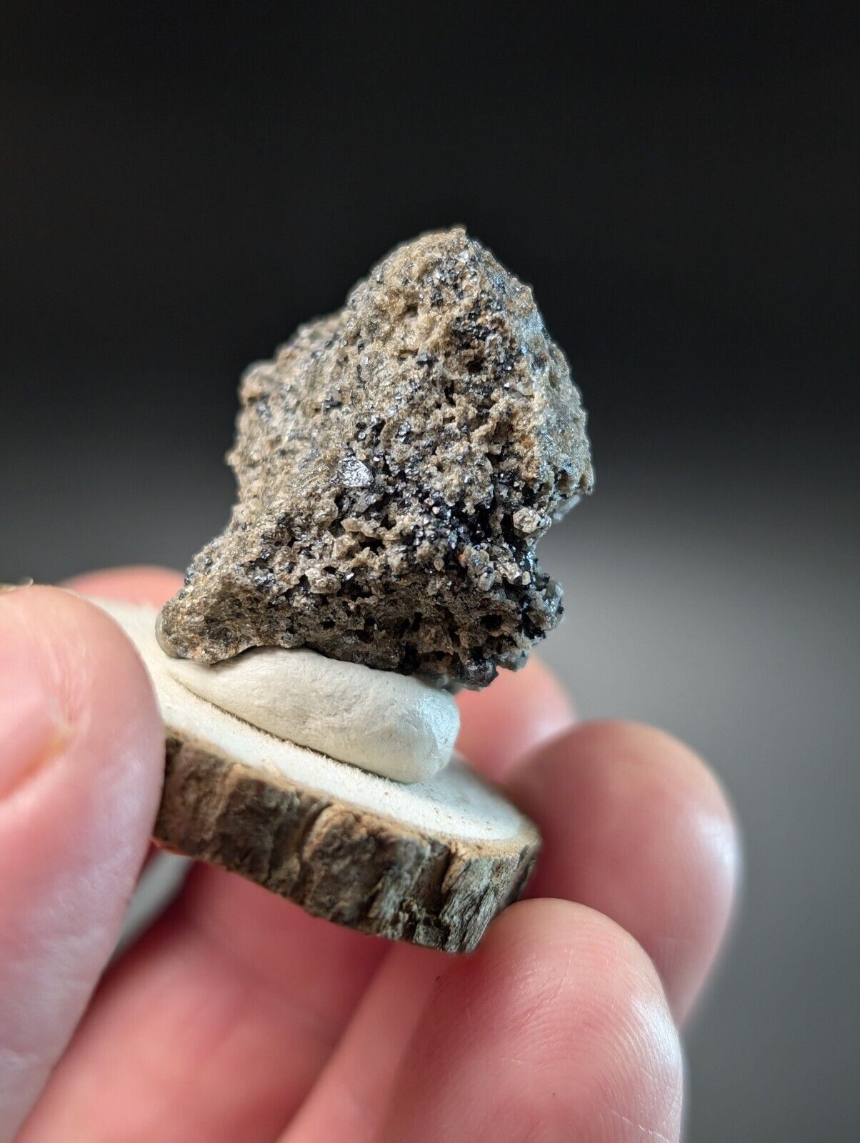 Rough, gray mineral specimen.