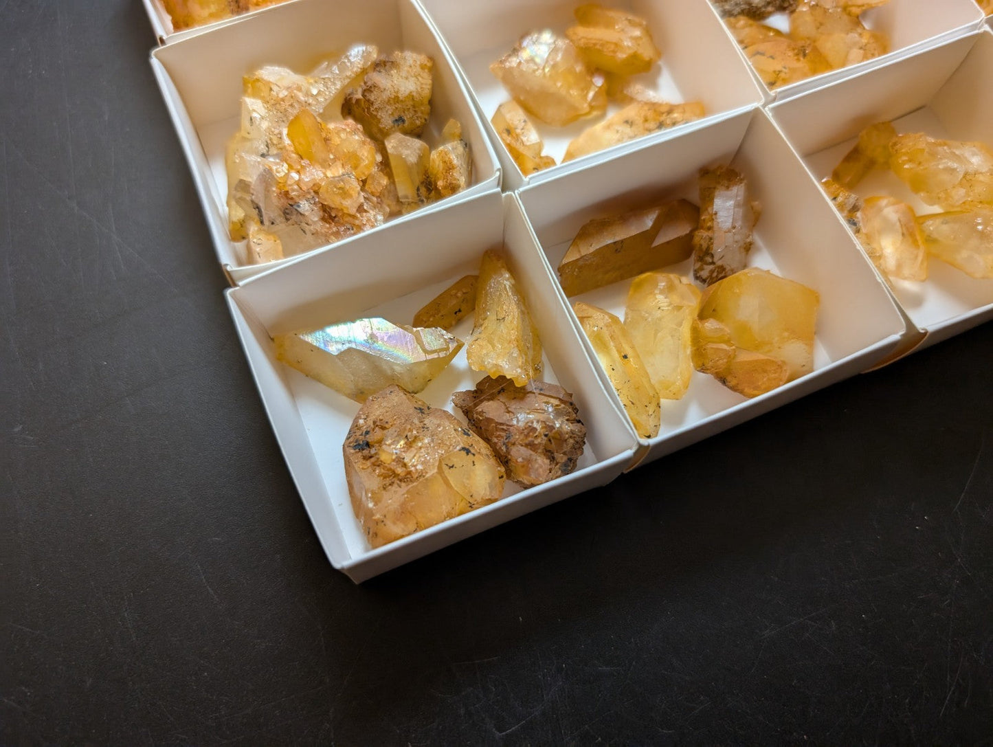 Yellow citrine crystals in white compartments.