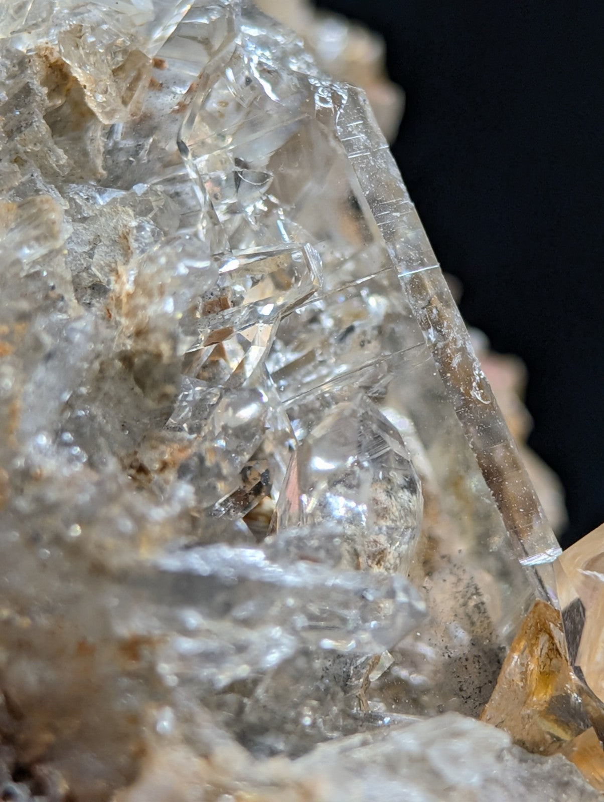 Clear quartz crystals with sharp, faceted edges and a translucent quality.