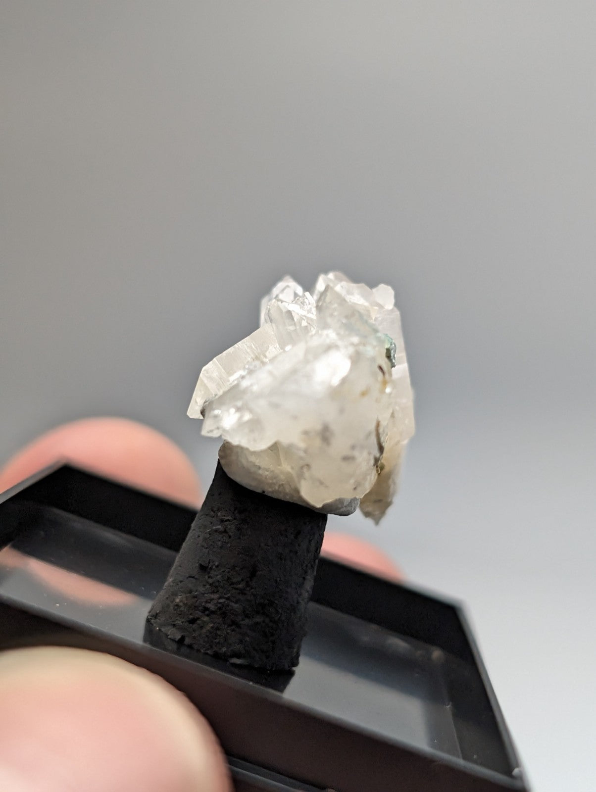 Translucent quartz crystal cluster with blue-green cookeite from saline county arkansas with pale milky white facets