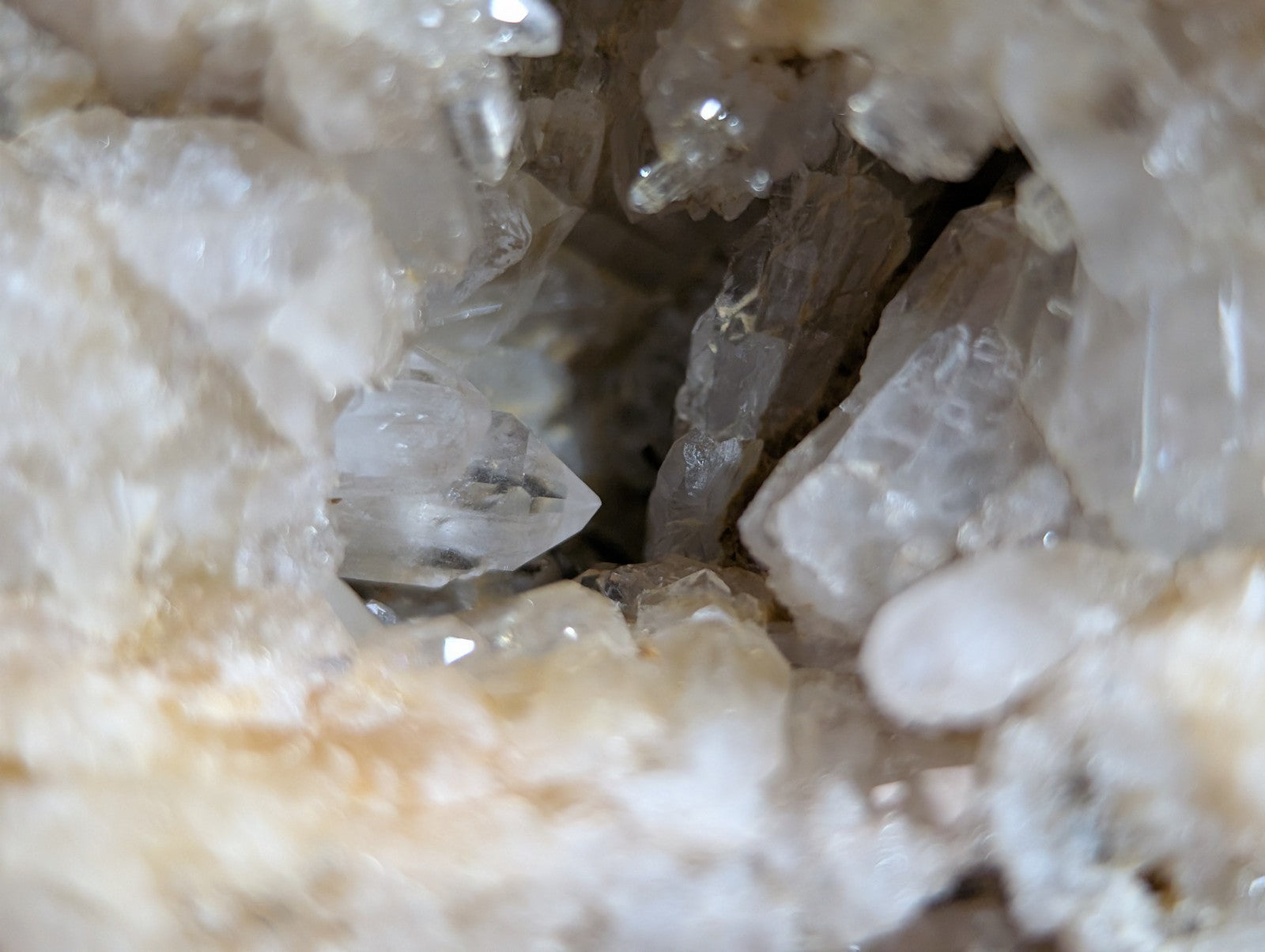 Quartz crystal cluster with clear translucent points solution quartz and creamy white cookeite matrix from arkansas