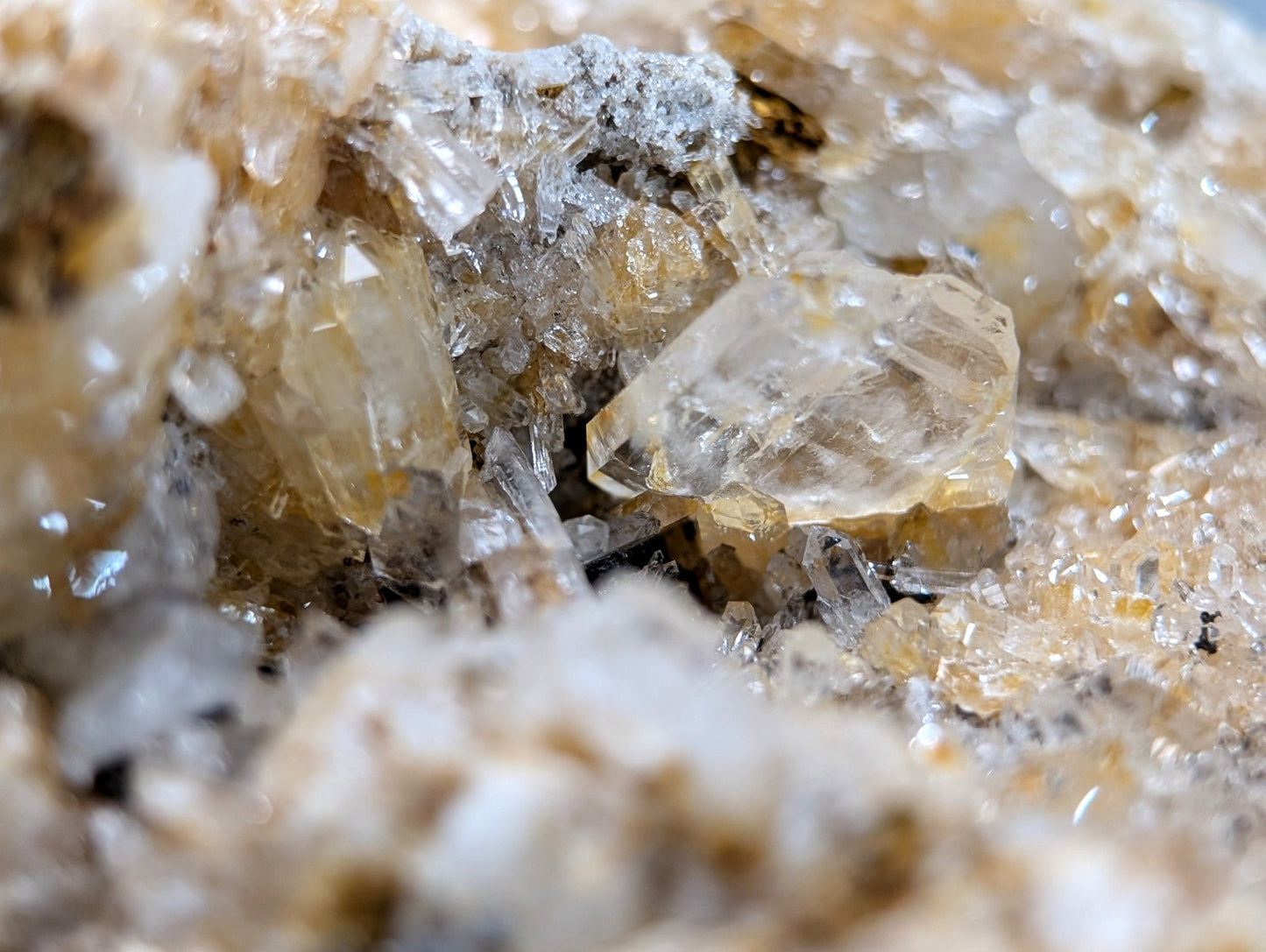 Quartz crystal cluster with translucent golden-yellow solution quartz and cookeite from Saline County Arkansas