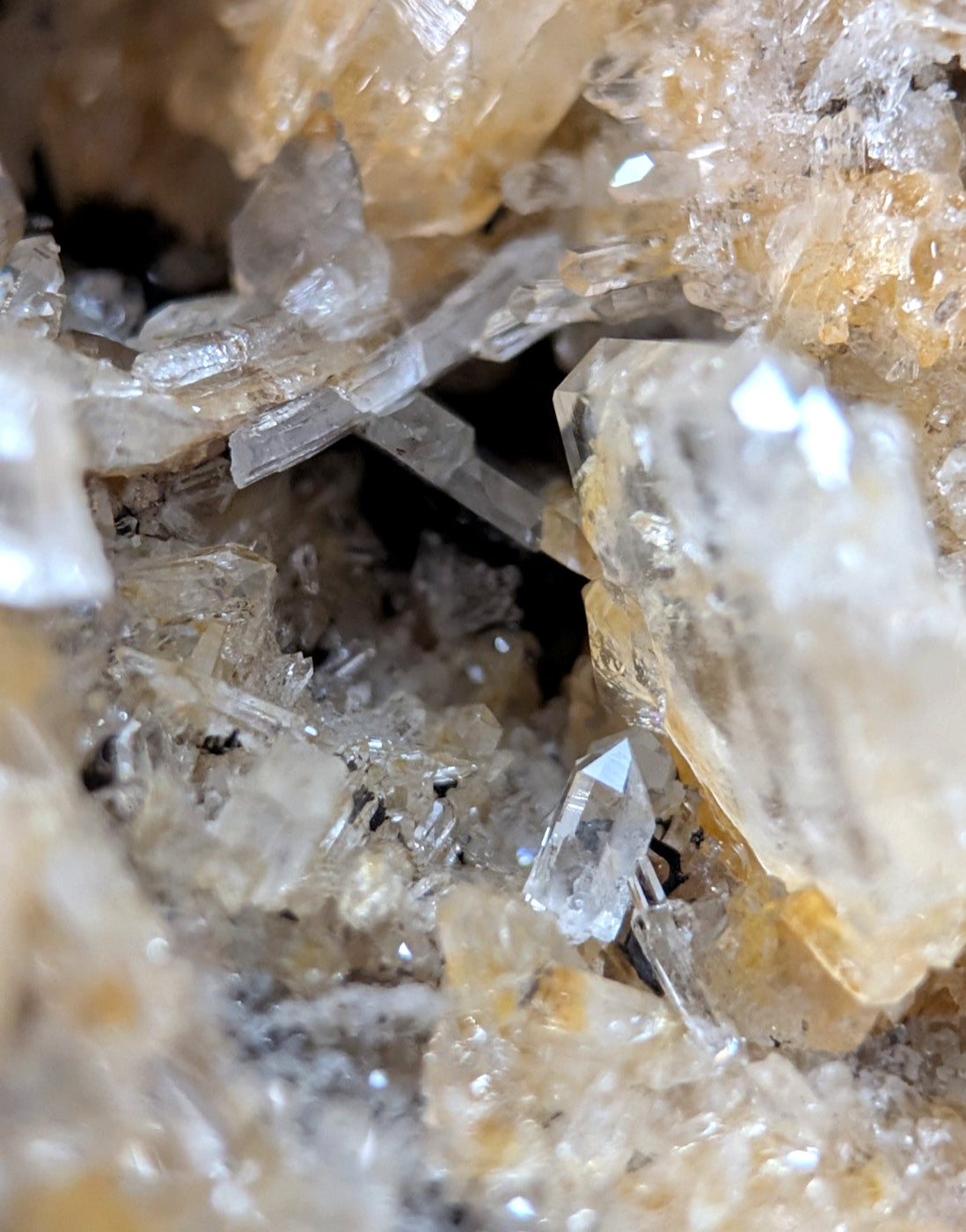 Quartz crystal cluster with clear translucent points and golden yellow cookeite inclusions from Saline County Arkansas