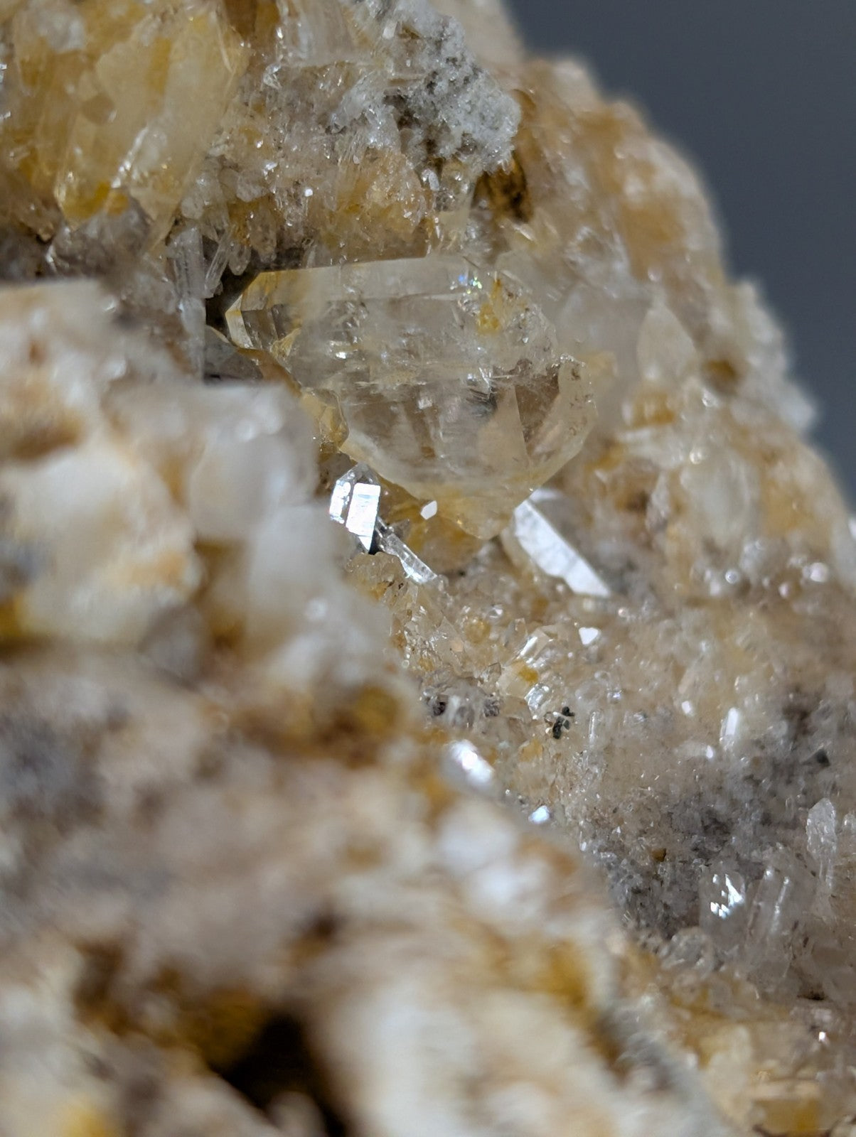 Translucent pale yellow quartz crystal cluster with metallic cookeite inclusions from saline county arkansas