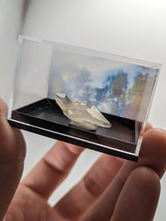 Quartz crystal in display case.