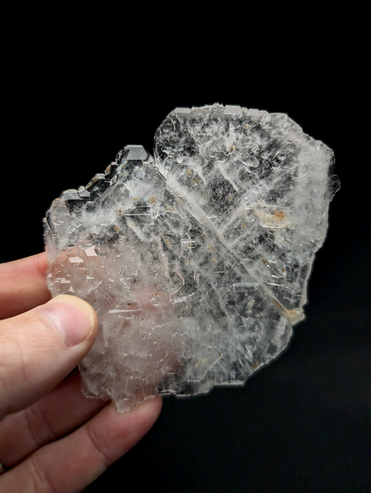 Rare and unique translucent clear quartz crystal cluster with intricate internal striations and jagged edges from Arkansas
