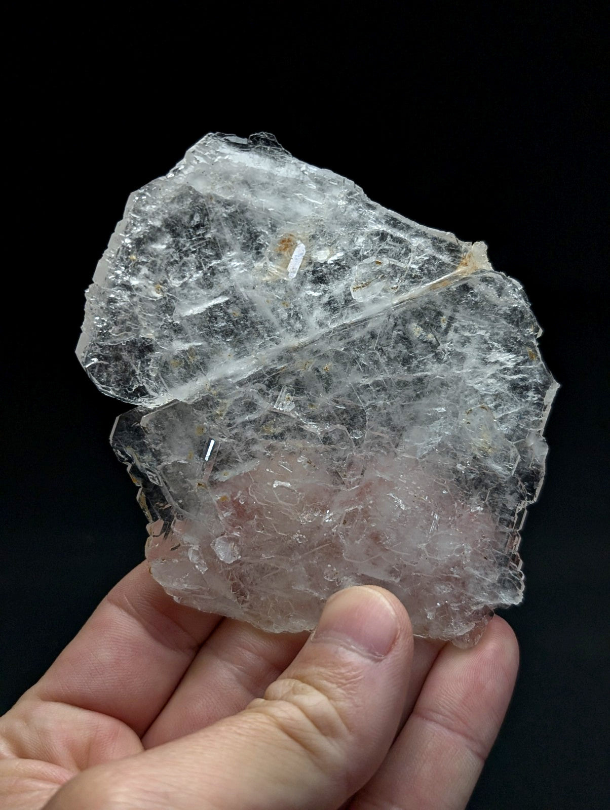 Rare and unique faden sheet quartz crystal cluster with translucent pinkish hue and visible internal fractures from Arkansas