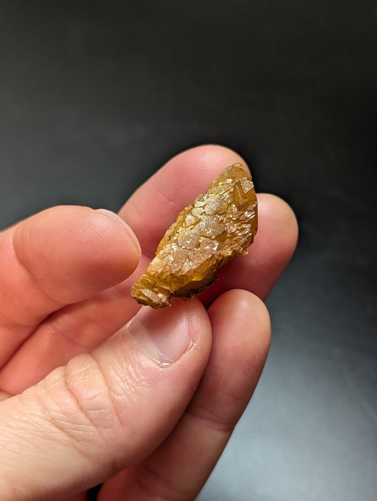 Translucent, golden-brown crystal.