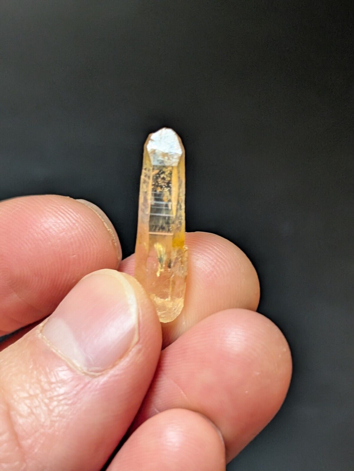 Translucent yellow crystal.