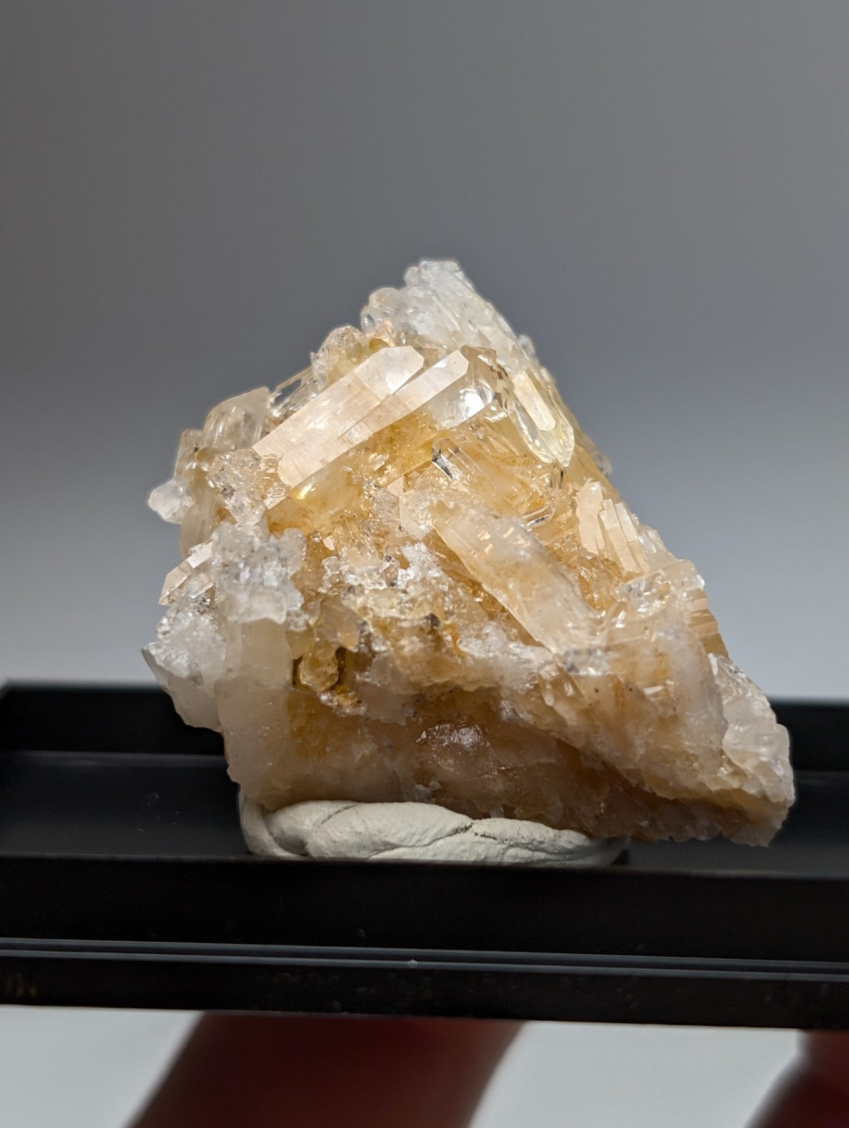 Solution quartz crystal cluster with translucent golden yellow faceted points on milky white matrix from arkansas