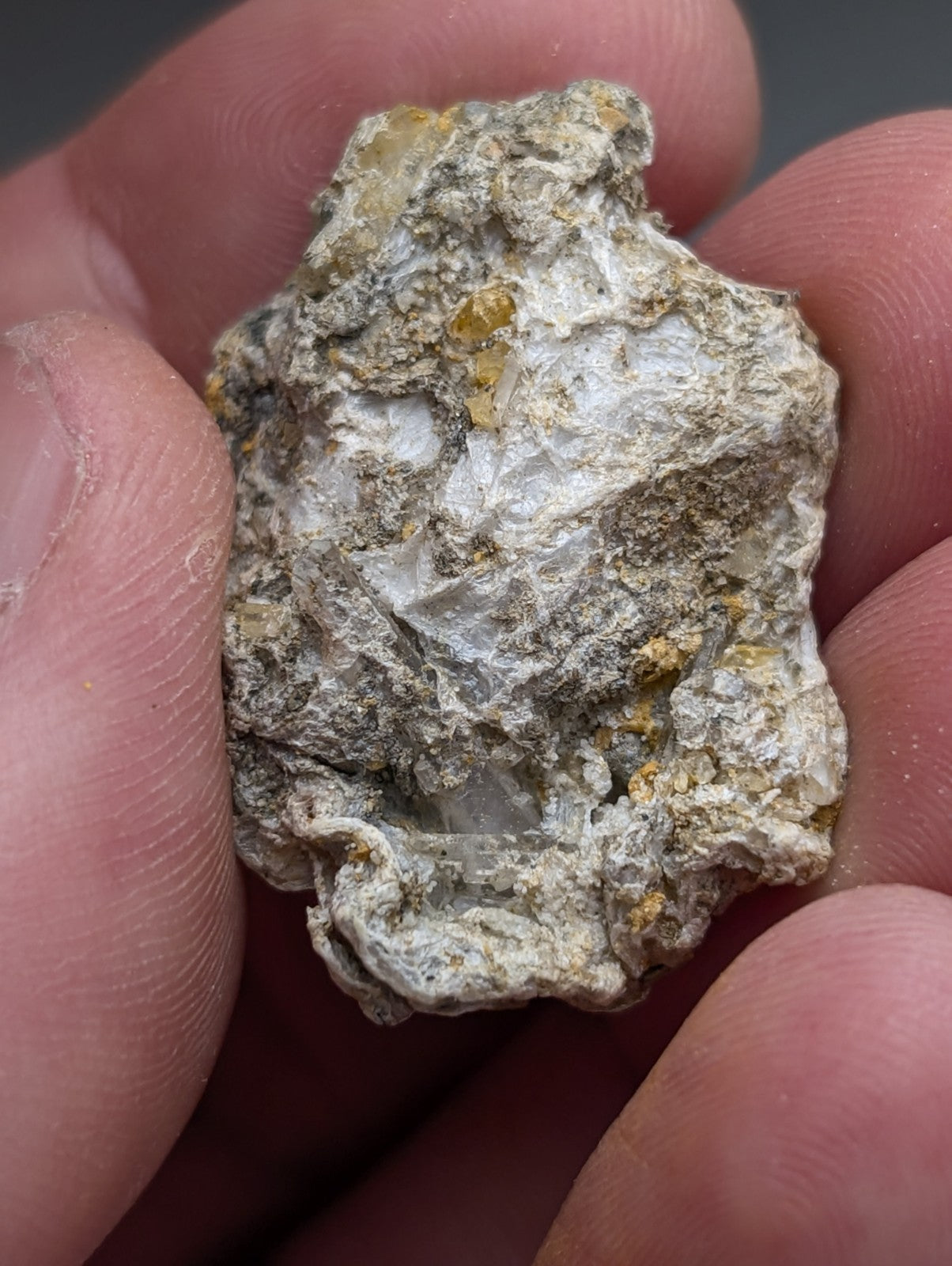 Solution quartz in rectorite mineral with white gray matrix and golden yellow crystals from jeffrey quarry arkansas