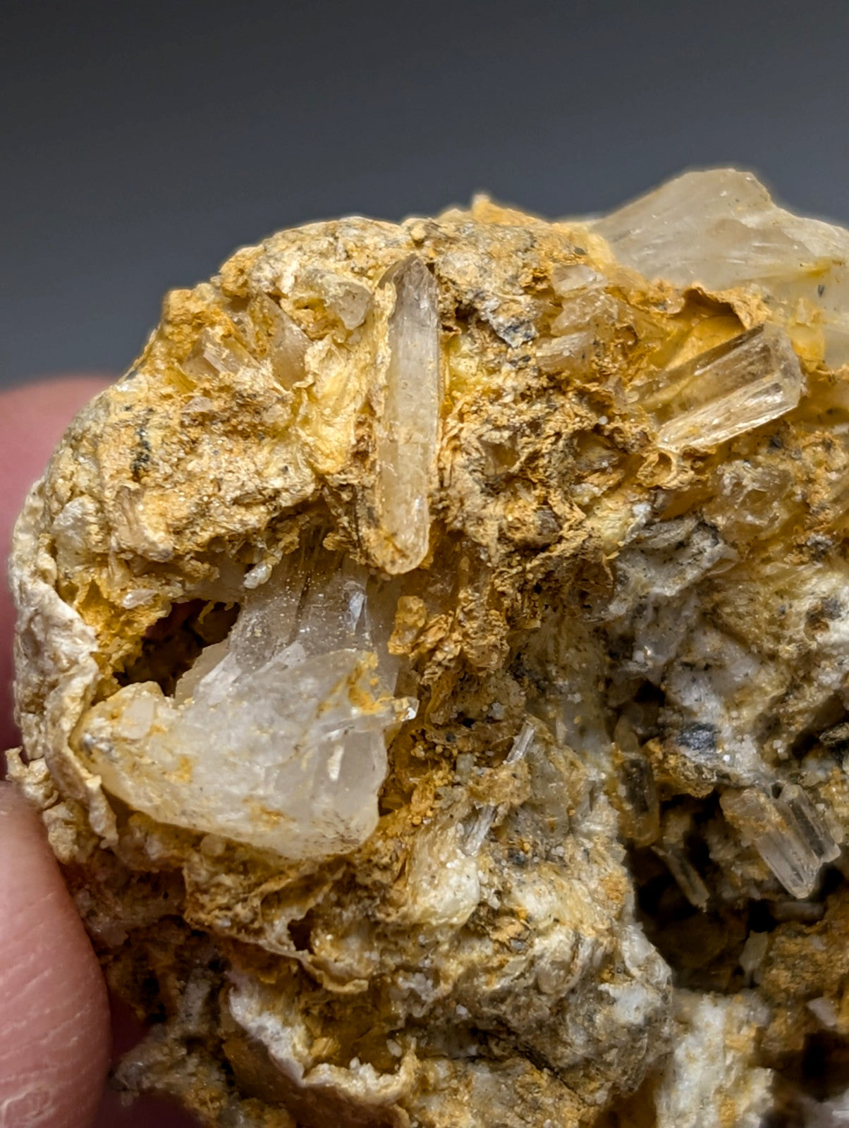 Solution quartz in rectorite featuring golden-yellow translucent quartz crystals on rugged matrix from jeffrey quarry arkansas